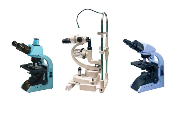 Beberapa Mikroskop Modern Dari Berbagai Desain Terisolasi Pada Latar Belakang — Stok Foto