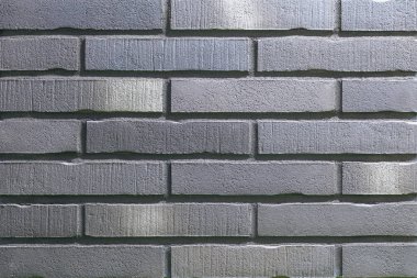 bir arka plan olarak farklı tonları tuğla yapılmış tuğla duvar