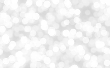 Beyaz ve gümüş soyut arkaplan arkaplan ve duvar kâğıdı Noel için bokeh ışıkları ile bulanık.
