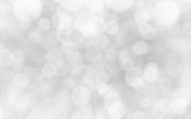 Beyaz ve gümüş soyut arkaplan arkaplan ve duvar kâğıdı Noel için bokeh ışıkları ile bulanık.