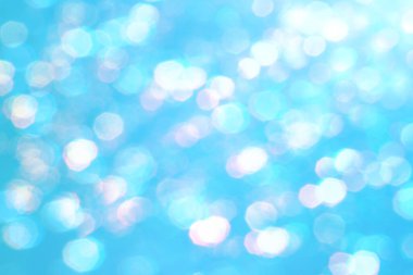 arkaplan ve duvar kağıdı Noel için bokeh ışıkları ile mavi soyut arkaplan.