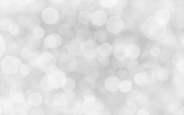 Beyaz ve gümüş soyut arkaplan arkaplan ve duvar kâğıdı Noel için bokeh ışıkları ile bulanık.