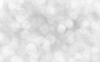 Beyaz ve gümüş soyut arkaplan arkaplan ve duvar kâğıdı Noel için bokeh ışıkları ile bulanık.