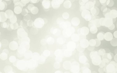Beyaz ve gümüş soyut arkaplan arkaplan ve duvar kâğıdı Noel için bokeh ışıkları ile bulanık.