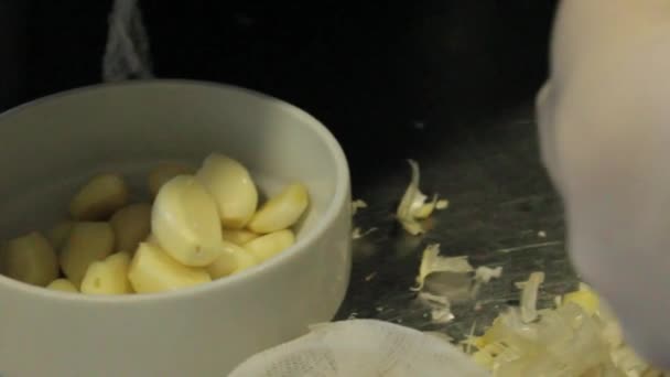 Cook Peeling Garlic Restaurant Kitchen — Stock Video