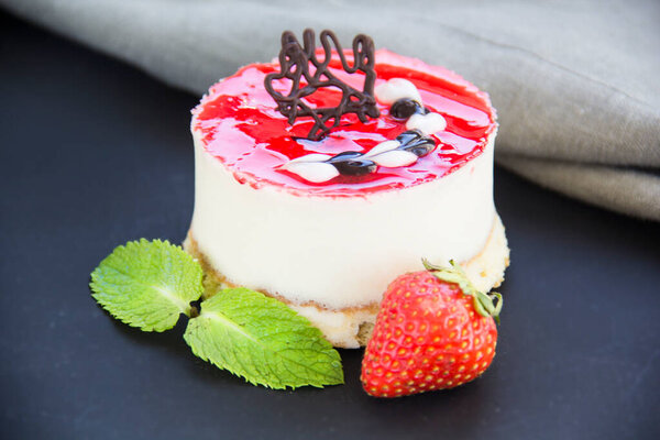 Italian dessert panna cotta with strawberries