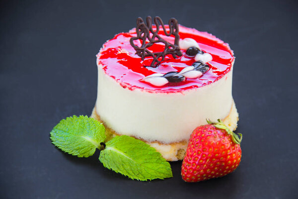 Italian dessert panna cotta with strawberries