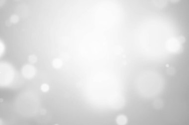 Bokeh soyut, gümüş ve beyaz, güzel bir arkaplan. Yumuşak renkli ışık parıltısı. Arkaplan ya da tasarım ürünleri, kozmetik reklamlar, kış, Noel, lüks, güzellik, bebek, modern, yaratıcı