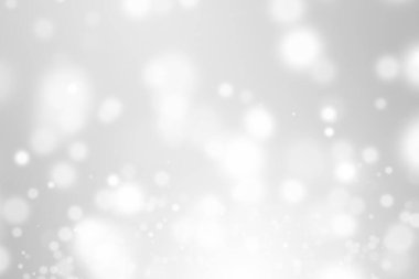 Bokeh soyut, gümüş ve beyaz, güzel bir arkaplan. Yumuşak renkli ışık parıltısı. Arkaplan ya da tasarım ürünleri, kozmetik reklamlar, kış, Noel, lüks, güzellik, bebek, modern, yaratıcı