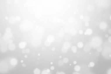 Bokeh soyut, gümüş ve beyaz, güzel bir arkaplan. Yumuşak renkli ışık parıltısı. Arkaplan ya da tasarım ürünleri, kozmetik reklamlar, kış, Noel, lüks, güzellik, bebek, modern, yaratıcı