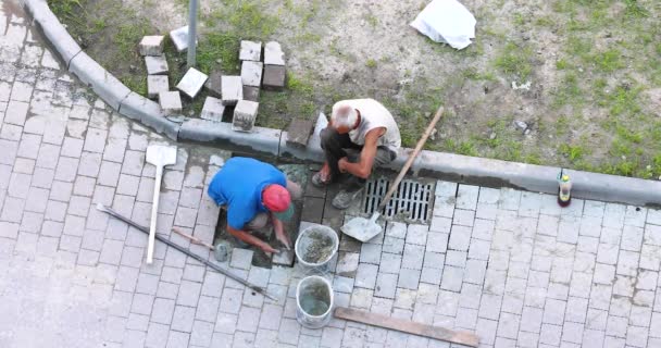 Two Workers Negligently Make Road Paved — Stock Video