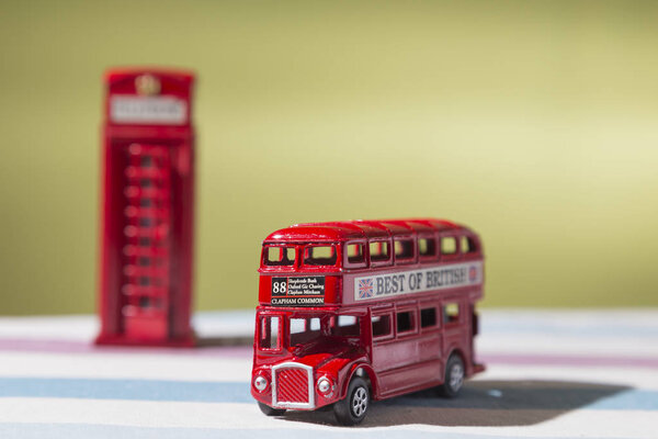 toys that represent two of the main symbols of the city of London, double-decker bus and red telephone box