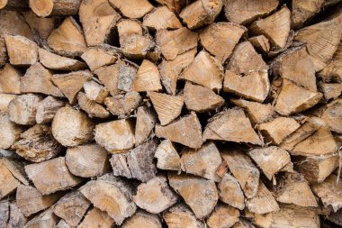 Yığınla kuru yakacak odunlarının arka planı