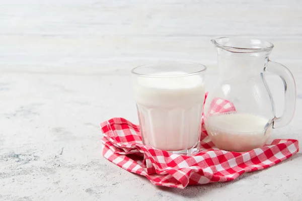 Glass Jug Milk Checkered Towel Wooden Background — Stock Photo, Image