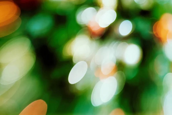 Verschwommene Weihnachtsbeleuchtung Abstrakter Hintergrund Mit Bokeh Effekt — Stockfoto