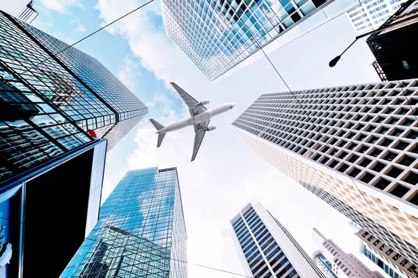 Airplane Flying Modern Skyscrapers City — Stock Photo, Image