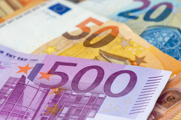 500 euro bank note among 50 and 20 euro bank notes. Close-up view
