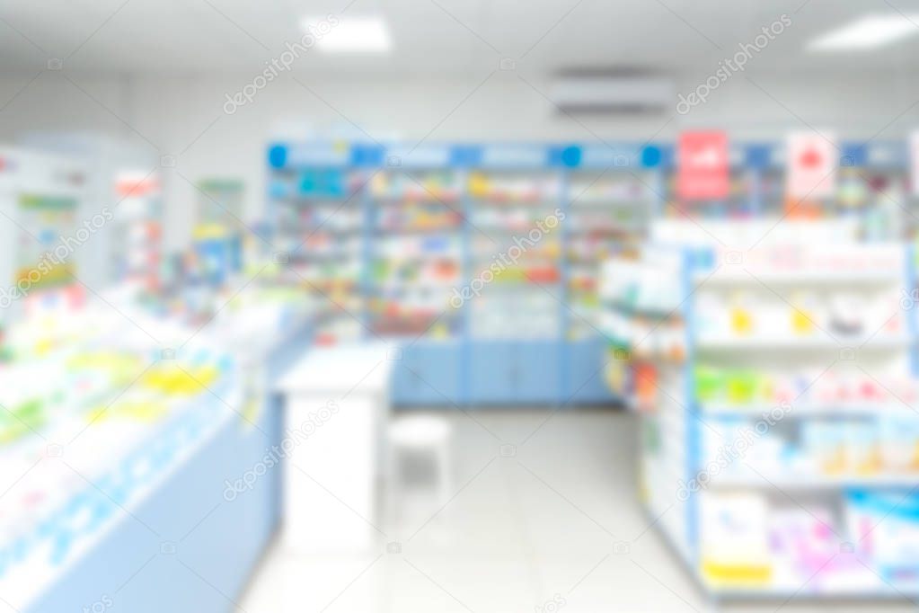 abstract background blur shelf with medicines and other goods in pharmacy store