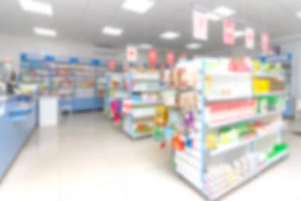 Abstrakter Hintergrund Verschwimmt Regal Mit Medikamenten Und Anderen Waren Apotheke — Stockfoto