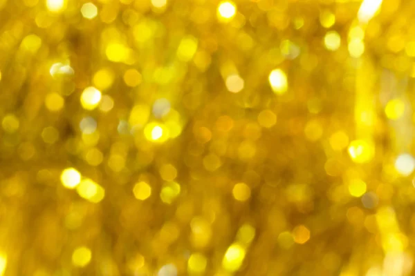抽象的なお祝いの黄金のぼやけたクリスマスの背景 — ストック写真