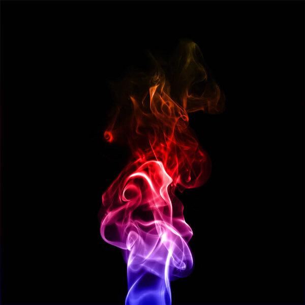 Colorful plume smoke isolated on black background closeup