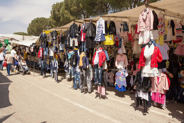 Ostuni, Italy - 28 april 2018: Stalls of clothes at the Ostuni market