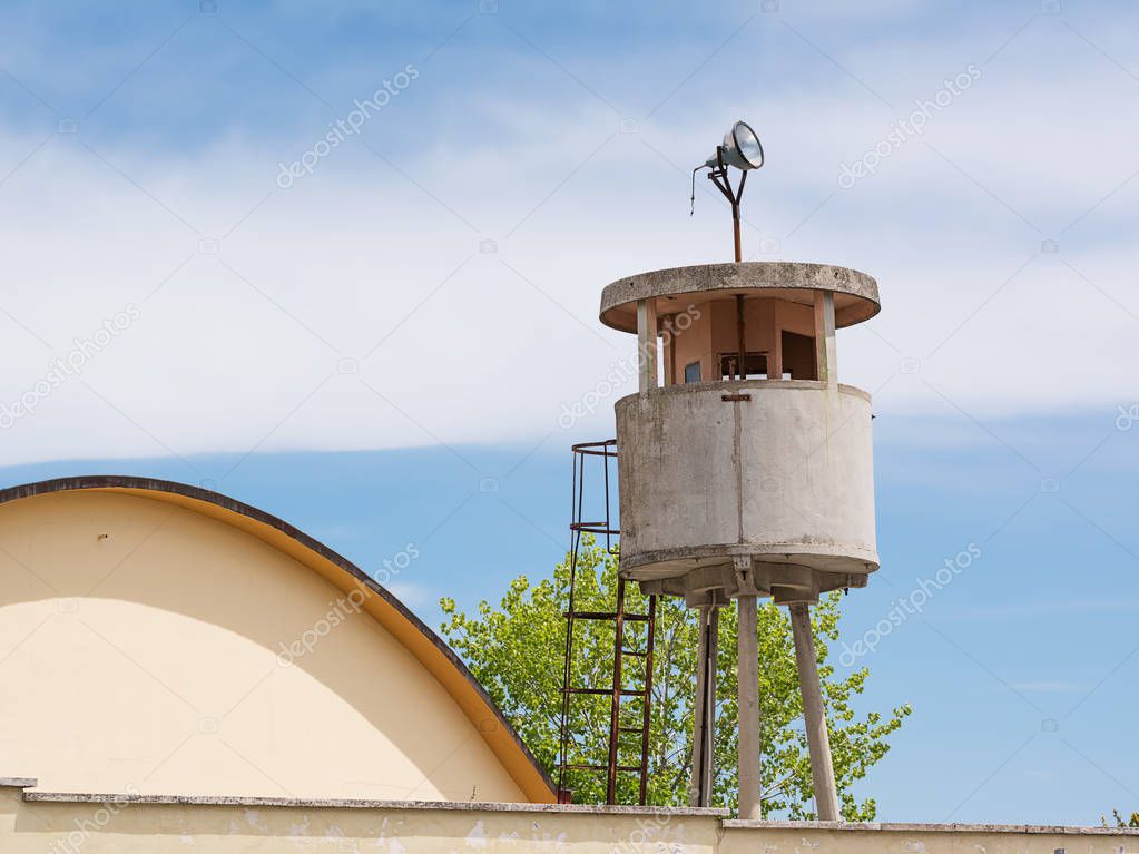 Reinforced concrete guard tower in a former military barracks