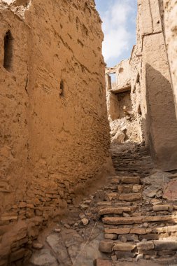 Stairway through the abandoned mud houses of Birkat Al Mouz (Oman)