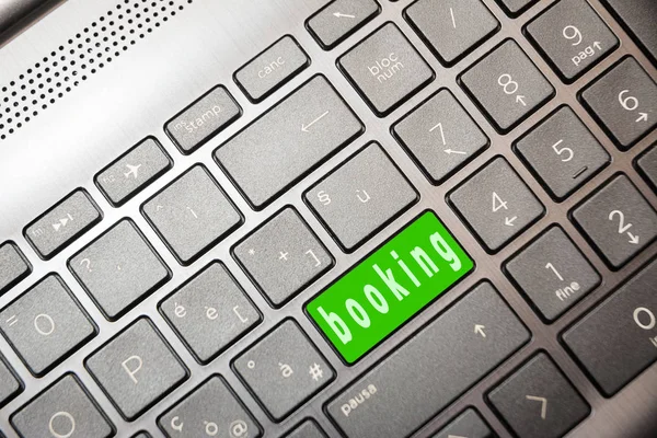 Green button on the computer with the word Booking — Stock Photo, Image