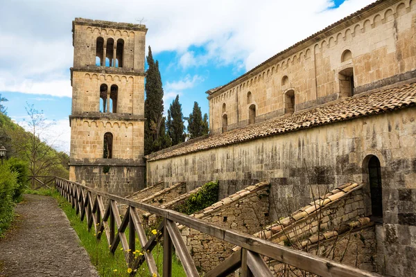 Bell tower and buttresses of the ancient Abbey of San Liberatore — Stock Photo, Image