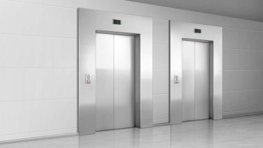 Modern ofis koridorunda metal asansör kapıları.