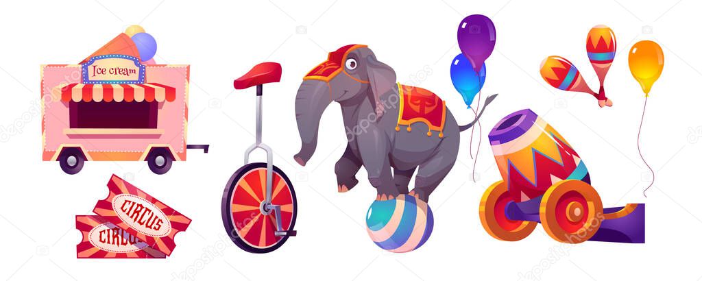 Circus stuff and elephant on ball, big top tent