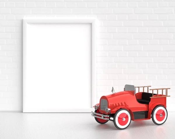 Rahmen-Attrappe mit Baby-Spielzeug-Oldtimer-Feuerwehrauto auf der weißen Rückseite — Stockfoto