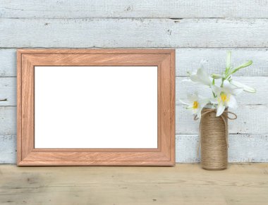 Lilyum bir buket yakın Eski Ahşap Çerçeve mockup Yatay A4