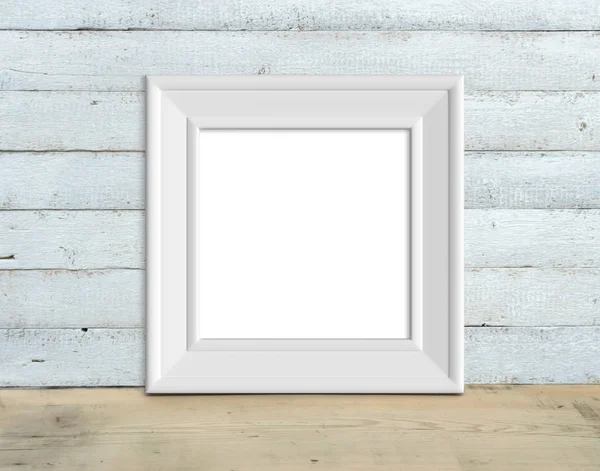 Square Vintage White Wooden Frame mockup stands on a wooden tabl — Stock Photo, Image