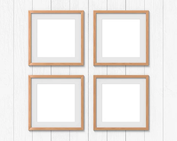 Zestaw 4 kwadratowych drewnianych ram makieta z obramowaniem wiszącym na ścianie. Pusta podstawa dla obrazu lub tekstu. Renderowanie 3D. — Zdjęcie stockowe
