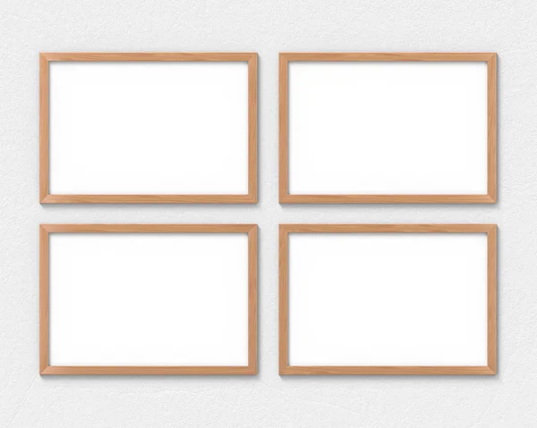 Set of 4 horizontal wooden frames mockup hanging on the wall. Empty base for picture or text. 3D rendering. — Stock Photo, Image