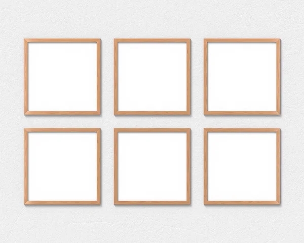 Conjunto de 6 marcos cuadrados de madera maqueta colgando en la pared. Base vacía para imagen o texto. Renderizado 3D . —  Fotos de Stock