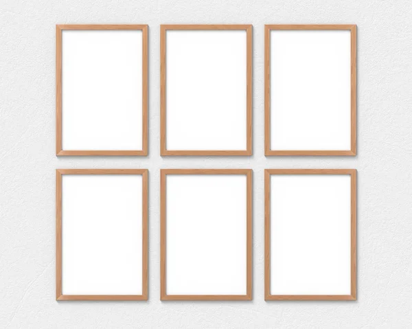 Conjunto de 6 molduras verticais de madeira com uma borda pendurada na parede. Base vazia para imagem ou texto. Renderização 3D . — Fotografia de Stock