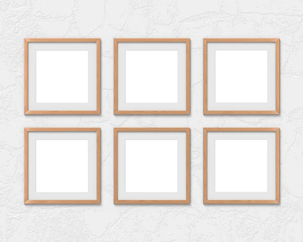 Conjunto de 6 quadros quadrados de madeira mockup com uma borda pendurada na parede. Base vazia para imagem ou texto. Renderização 3D . — Fotografia de Stock