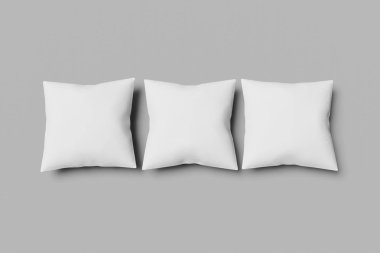 Gri bir arka plan üzerinde üç Beyaz kare mocap yastık. 3d render.