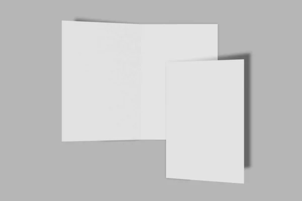 Дві макетні вертикальні буклети, брошура, запрошення ізольовані на сірому фоні з твердою обкладинкою і реалістичною тіні. 3D візуалізація . — стокове фото