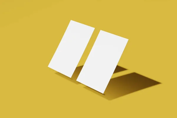 Dois Mockup negócio em branco ou cartão de nome em um fundo amarelo. Renderização 3D — Fotografia de Stock