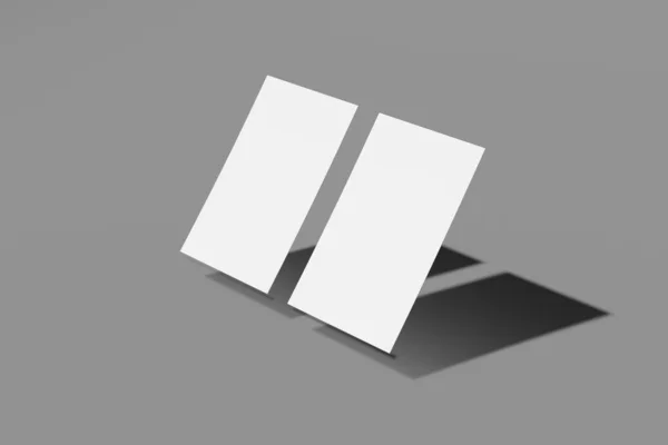 Dos Mockup en blanco de negocios o tarjeta de nombre sobre un fondo gris. Renderizado 3D —  Fotos de Stock