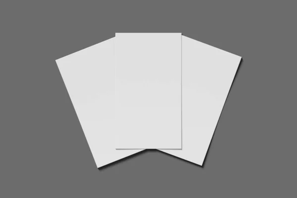 Tres Mockup en blanco de negocios o tarjeta de nombre sobre un fondo gris. Renderizado 3D —  Fotos de Stock