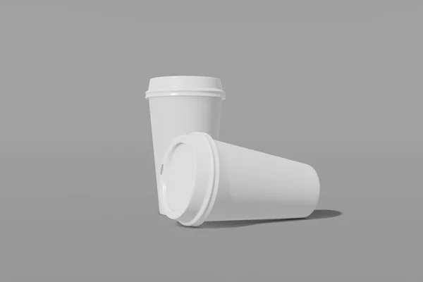 Due tazze mockup di carta bianca con coperchio su fondo grigio. Una tazza verticalmente, la seconda orizzontalmente sul suo lato. Rendering 3D — Foto Stock
