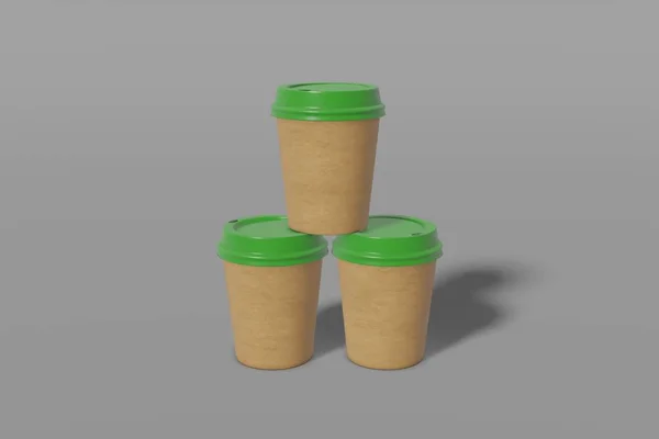 Набір з трьох коричневих паперових чашок макет з зеленою кришкою у формі піраміди на сірому фоні. 3D візуалізація — стокове фото