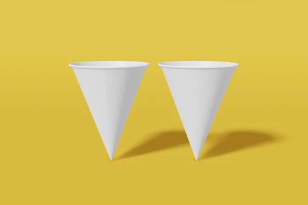 Set van twee witte papieren mockup cups kegelvormig op een gele achtergrond. 3D-rendering — Stockfoto