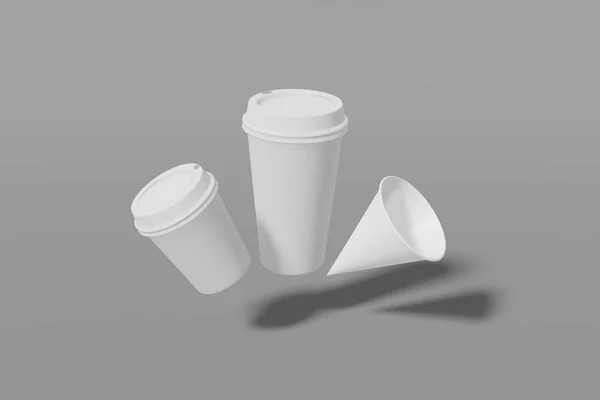 Комплект из трех белых бумажных макетов чашки разных размеров - большие, маленькие и конусообразные мухи на сером фоне. 3D рендеринг — стоковое фото