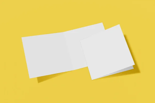 Dois folheto quadrado Mockup, brochura, convite isolado em um fundo amarelo com capa dura e sombra realista. Renderização 3D . — Fotografia de Stock